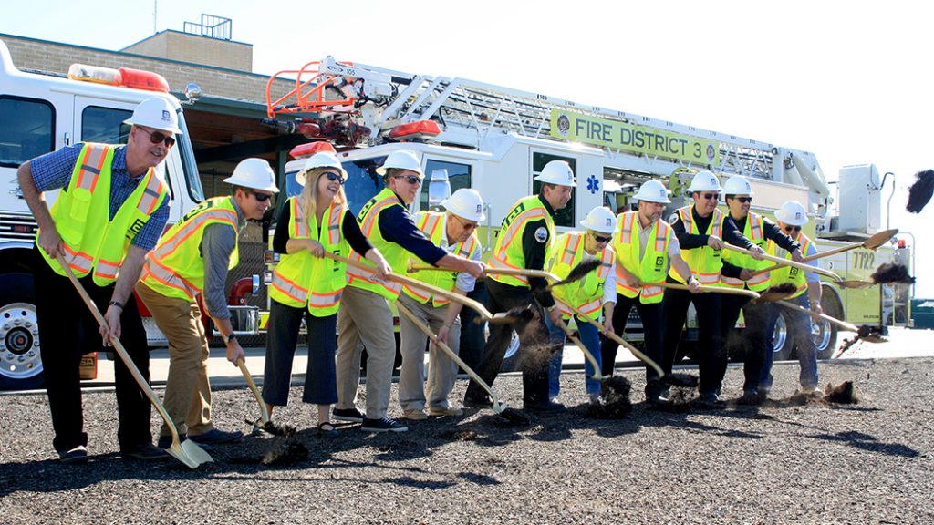 RCC and Fire District 3 officials throw dirt at the groundbreaking ceremony of the new Educational Center.