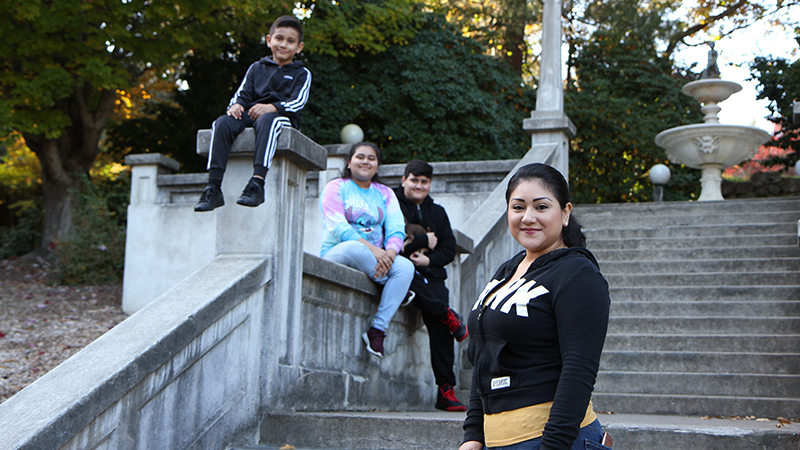 RCC student Juliette Antolin poses for a photo with her three children.