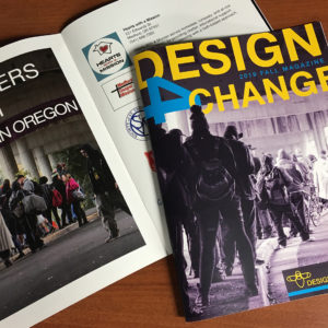 Two issues of Design 4 Change magazine lay on a table