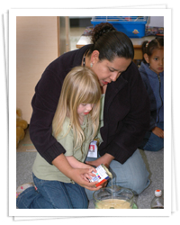 child care worker with child